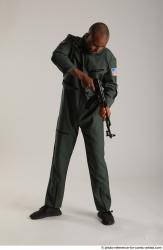 Man Adult Average Black Fighting with gun Standing poses Army